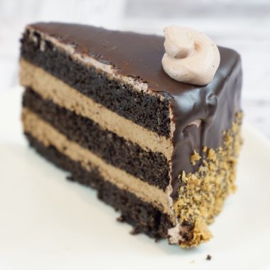 savor the classic flavor of a homemade chocolate mousse cake slice at Mia's Bakery.