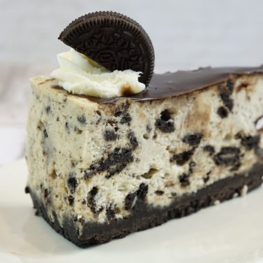 savor the classic flavor of a traditional oreo cheesecake slice at Mia's Bakery.