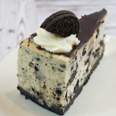 savor the classic flavor of a traditional oreo cheesecake slice at Mia's Bakery.