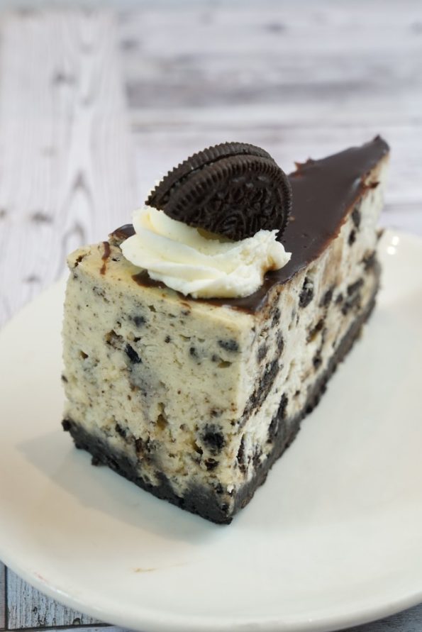 savor the classic flavor of a traditional oreo cheesecake slice at Mia's Bakery.