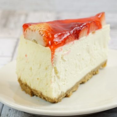 savor the classic flavor of a traditional strawberry cheesecake slice at Mia's Bakery.