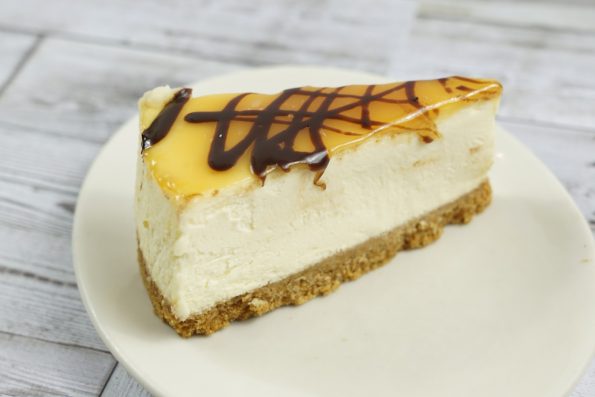 savor the classic flavor of a NY-style caramel cheesecake slice at Mia's Bakery.