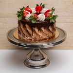 savor the classic flavor of our traditional 7 layer cake at Mia's Bakery.