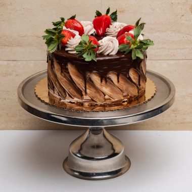 savor the classic flavor of our traditional 7 layer cake at Mia's Bakery.