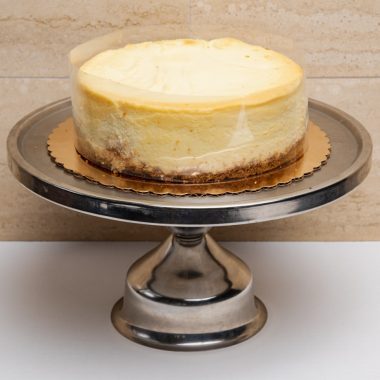 savor the classic flavor of a traditional New York cheesecake at Mia's Bakery.
