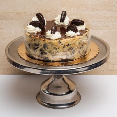 savor the classic flavor of a traditional oreo cheesecake at Mia's Bakery.