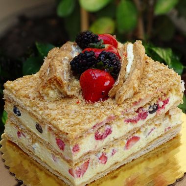savor the classic flavor of a traditional napoleon cake at Mia's Bakery.