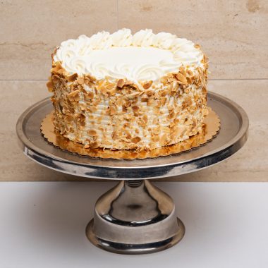 indulge in the delightful burnt almond cake at Mia's Bakery.