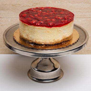 savor the classic flavor of a traditional New York style cherry cheesecake at Mia's Bakery.