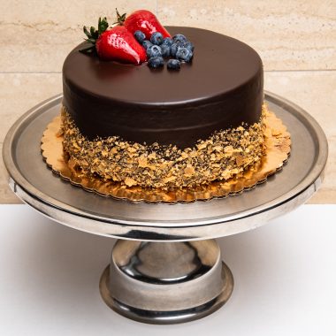 savor the classic flavor of a homemade chocolate mousse cake at Mia's Bakery.