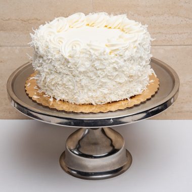 savor the classic flavor of a traditional coconut cake at Mia's Bakery.