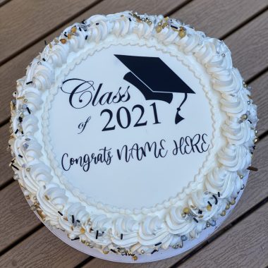 savor the classic flavor of a custom graduation cake at Mia's Bakery.