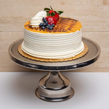 savor the classic flavor of a homemade salted caramel cake at Mia's Bakery.