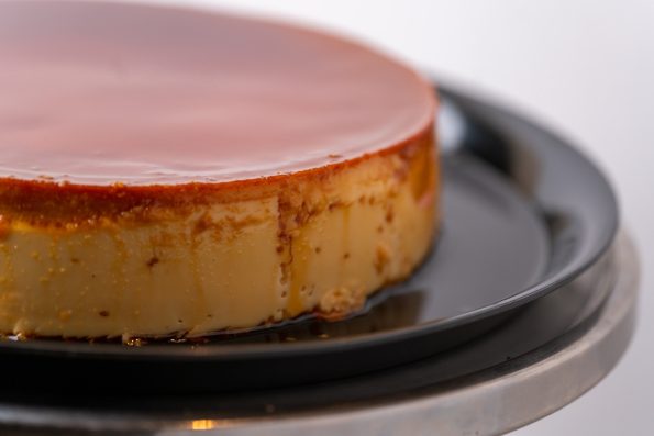 savor the classic flavor of a traditional flan at Mia's Bakery.