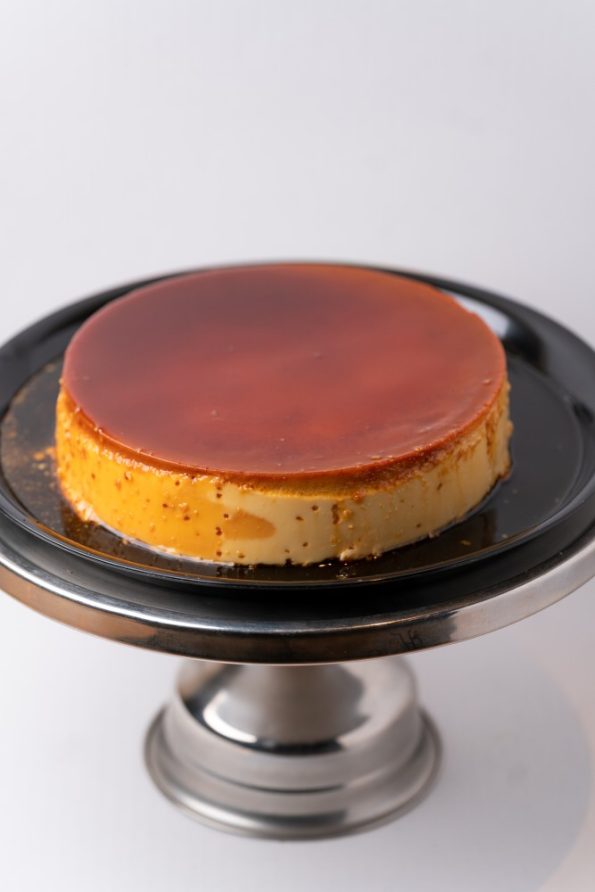 savor the classic flavor of a traditional flan at Mia's Bakery.