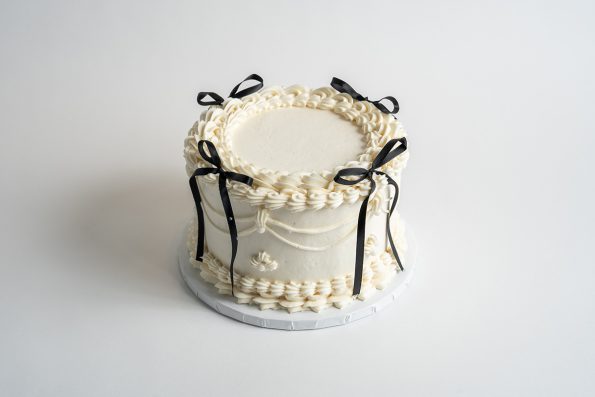 Vintage White Cake with Black Ribbon Bows