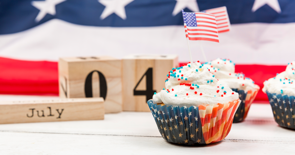 Patriotic cupcakes with red white and blue sprinkles and American flag for 4th of July dessert ideas