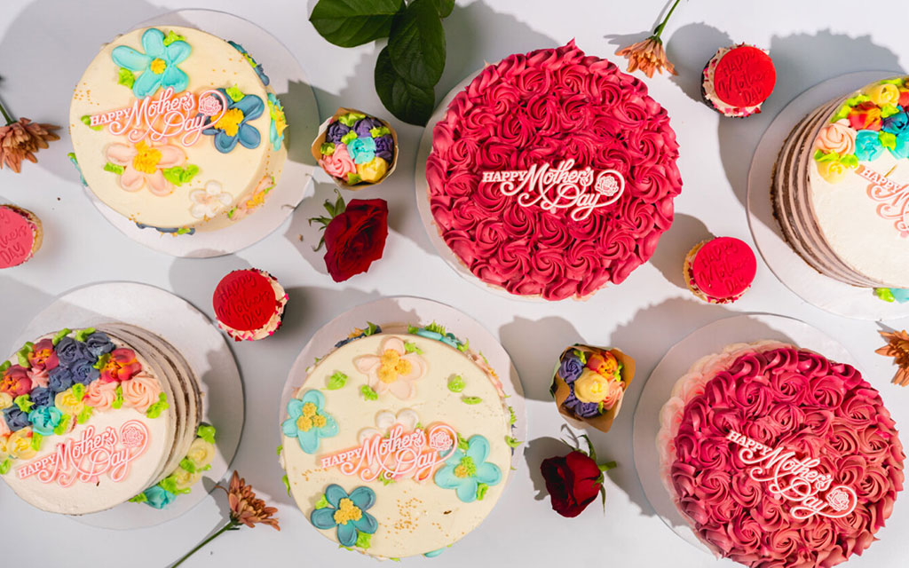 Mother's Day dessert ideas including decorated cakes and cupcakes with floral designs and pink frosting